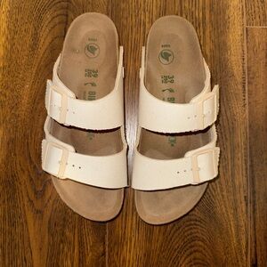 Birkenstock Cream Sandals with Wide Straps and Contoured Footbeds
